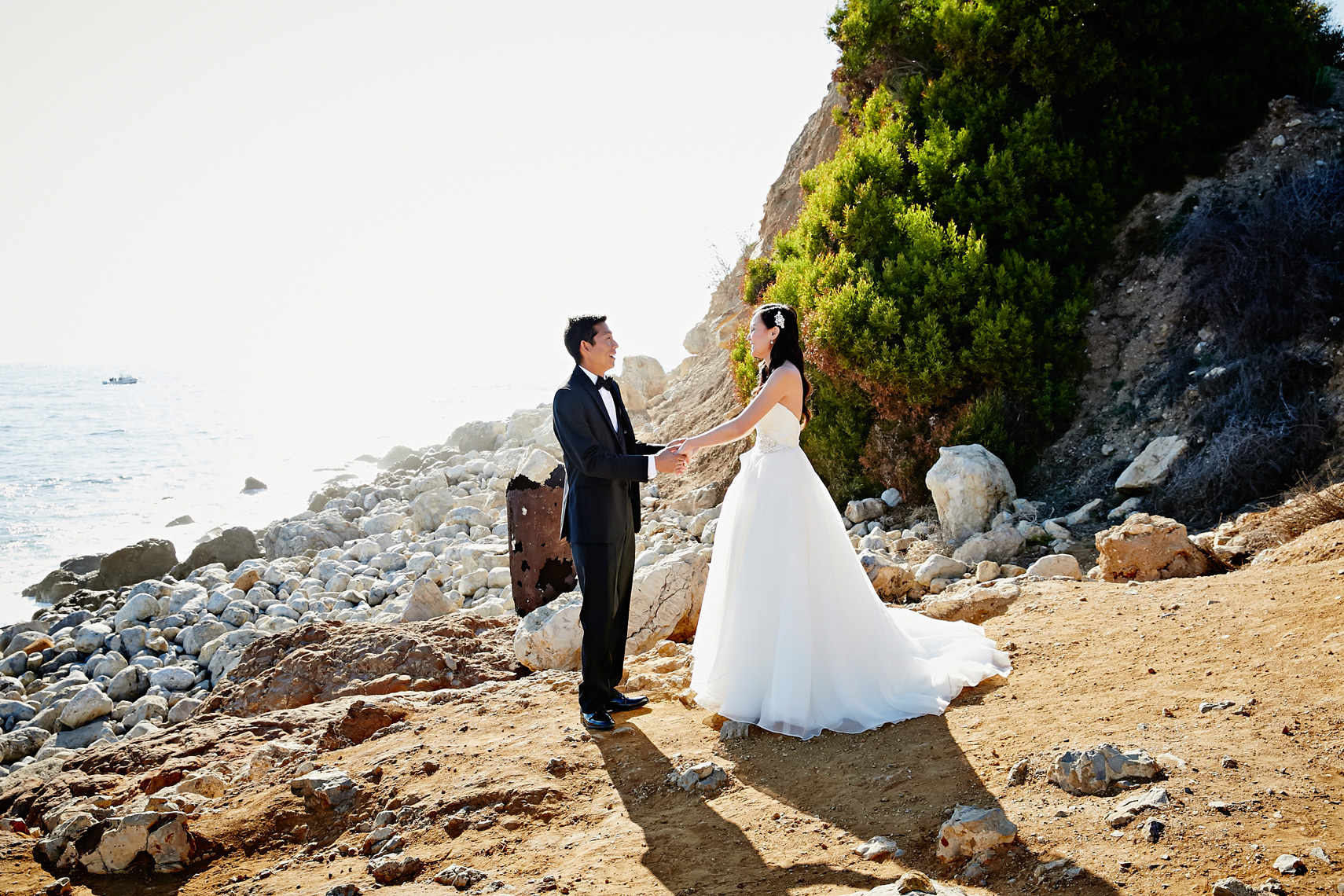 Bride and Groom embrace after first look at Terranea resort in Los Angeles California
