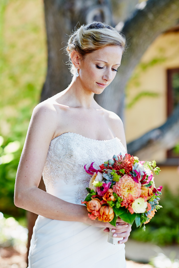 Bride waits for groom during first look during wedding at private estate in Palo Alto, California