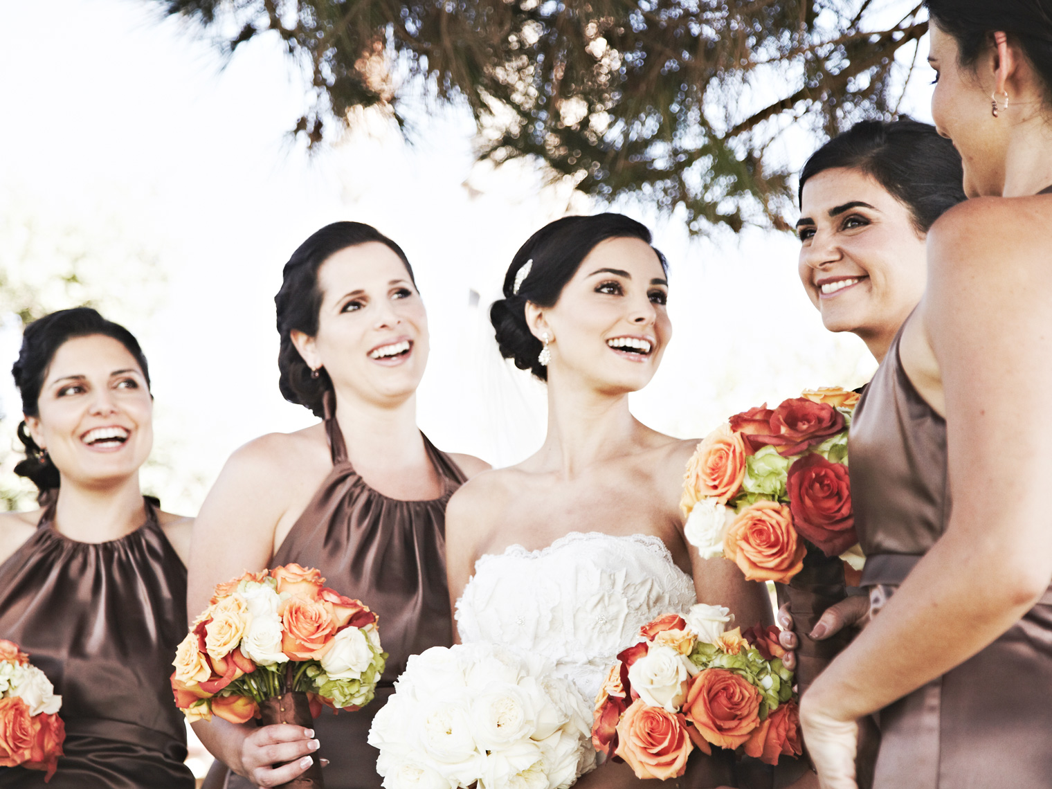 Brides with bridesmaids at Montage Resort Laguna Beach, California