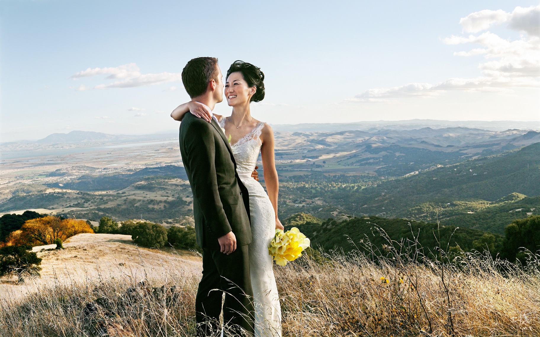 Bride and Groom Portrait over Napa Valley, California. Destination Wedding location.