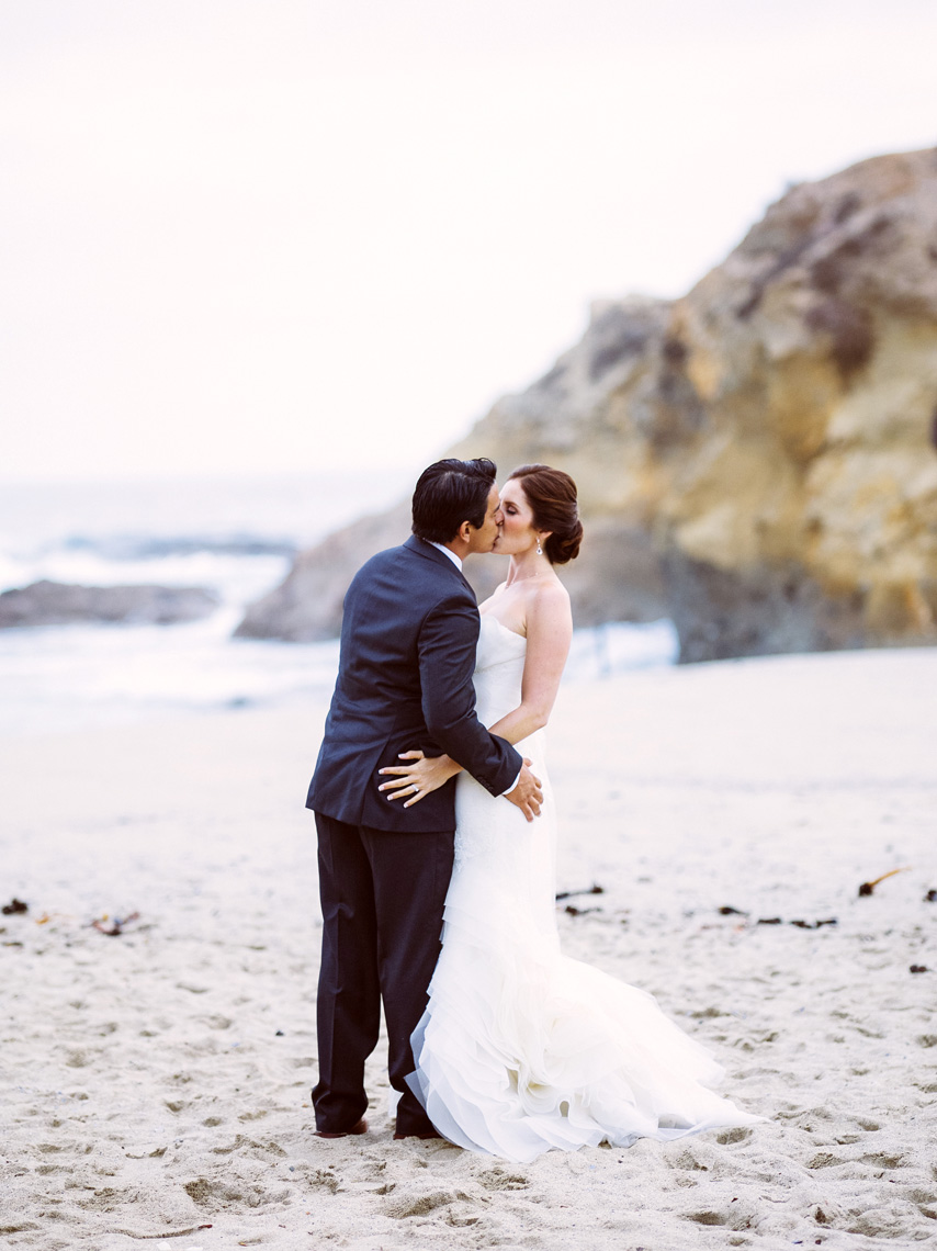 Bride and Groom kiss after ceremony at Montage Resort, Laguna Beach.